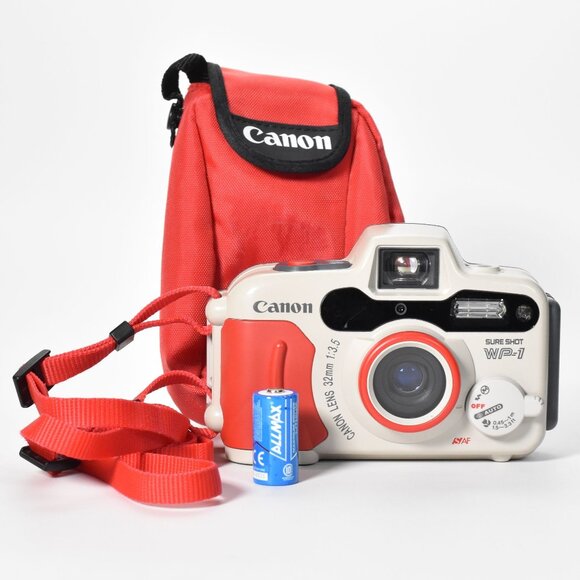 Canon Sure Shot WP-1 Waterproof 35mm Camera with 32mm f/3.5 Lens w/Canon Bag - Picture 1 of 14